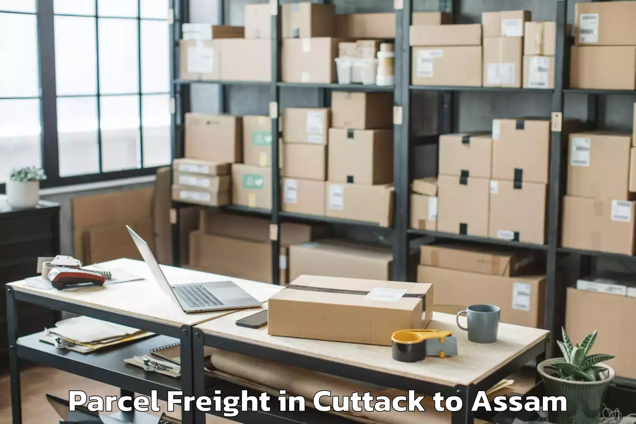 Cuttack to Laharighat Parcel Freight